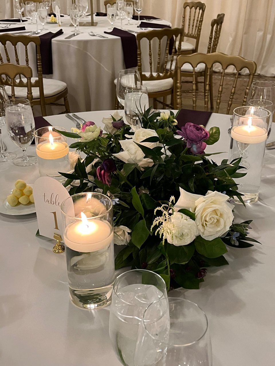 Centerpiece Style 2: Meadow and candles by Southside Blooms