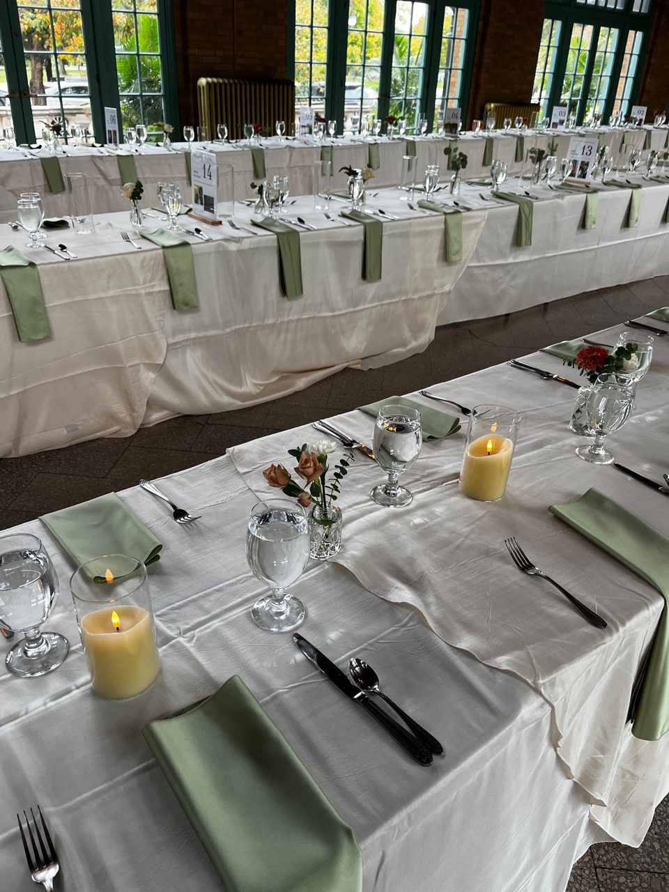 Centerpieces: Bud vases and candles by Southside Blooms