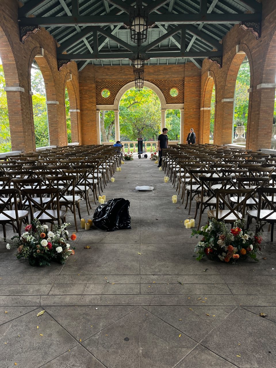 Aisle Decor: Arrangements and candles by Southside Blooms