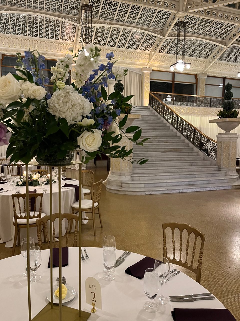 Centerpiece Style 1: Tall centerpieces by Southside Blooms